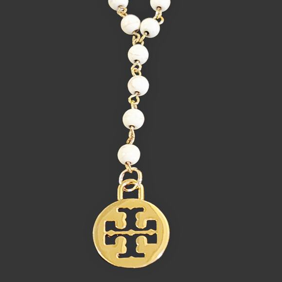 Tory Burch Dust Bag Charm Reimagined on White Beaded Adjustable Lariat Necklace - Picture 2 of 3